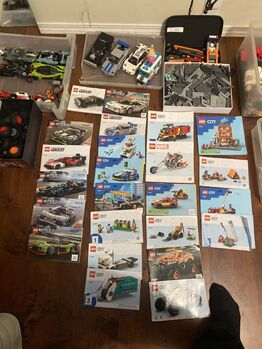 Assorted Lego sets , completed cars, figures and colour assorted also with Manuel booklets, Lego, Lannie Piche, Diverses, Cold Lake