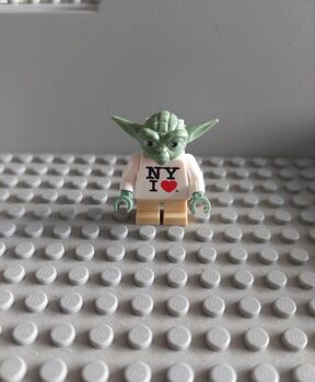 For sale is an authentic LEGO Star Wars “I ❤️ NY” Yoda minifigure, originally released as a rare pro, Lego, Mr o hair, Star Wars, Cork