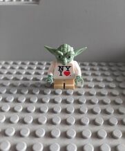 For sale is an authentic LEGO Star Wars “I ❤️ NY” Yoda minifigure, originally released as a rare pro Lego